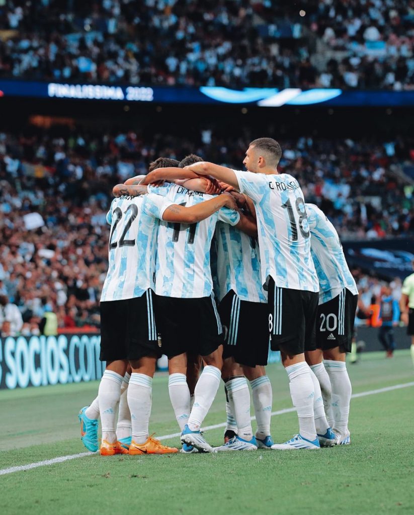 argentina team group hug