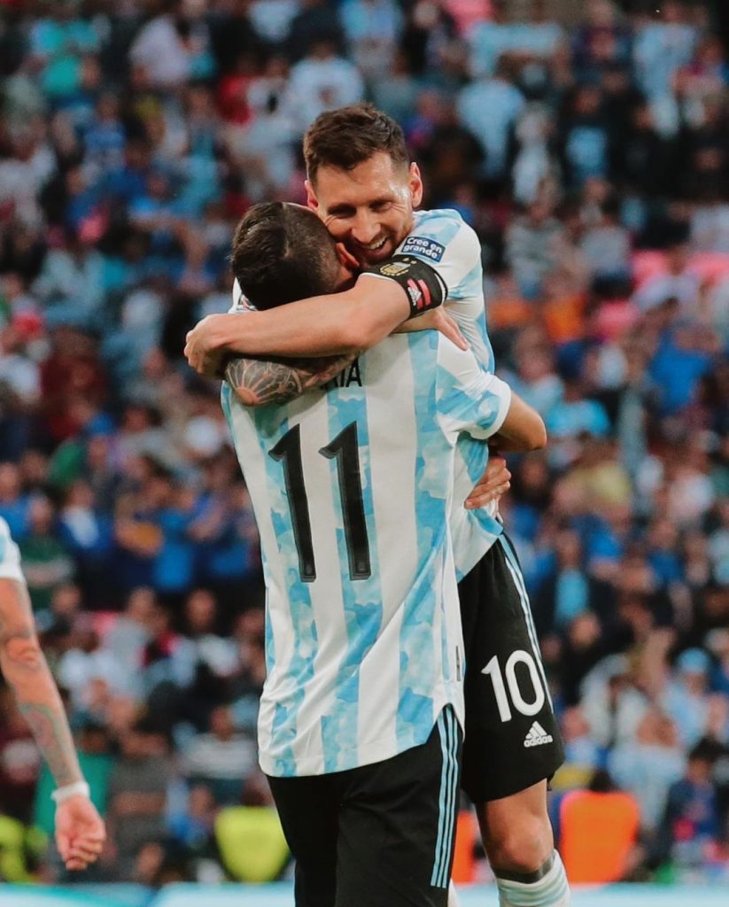 messi hugs a player