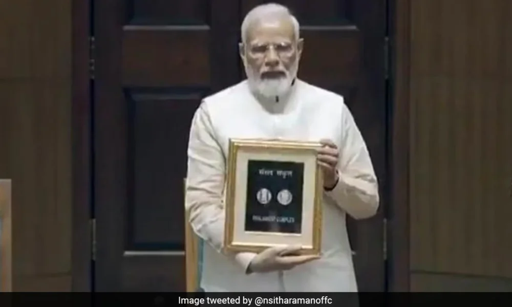 Modi issues a Rs. 75 coin to commemorate the opening of the new Parliament