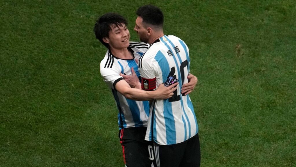 Chinese fan hugs Messi