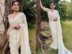 Raveena Tandon is a picture of elegance in white saree for wedding