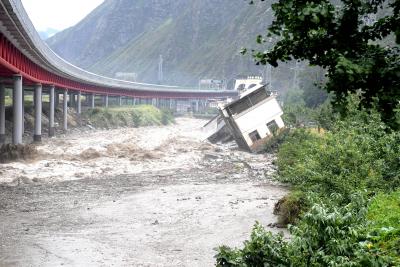 Over 30 missing after rain-triggered flash floods in China