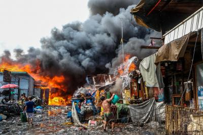 11 killed after fire hits building in Philippines' Manila